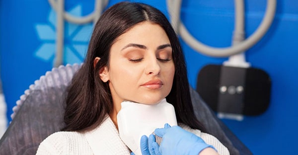Patient receiving chin CoolSculpting